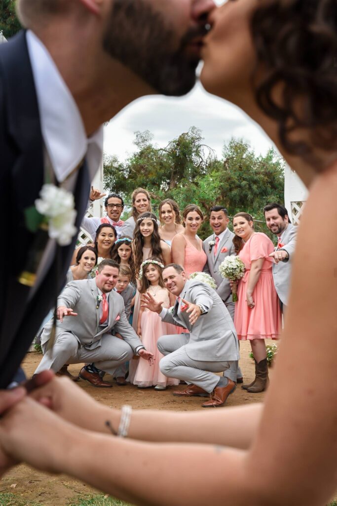 kissing in front of bridal party